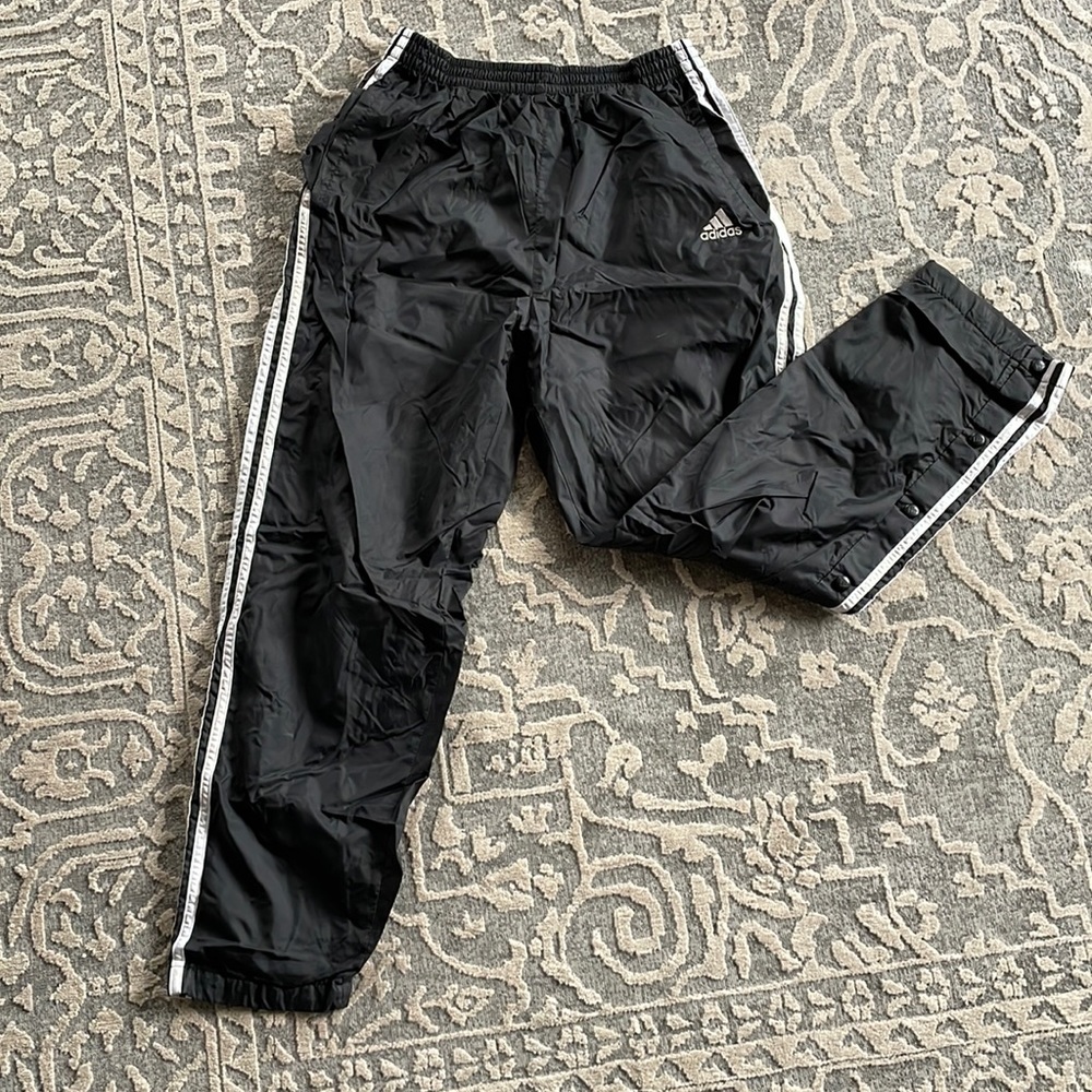 Men’s fleece lined wind breaker pants.